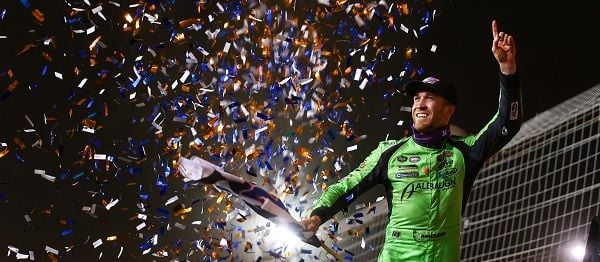 Carson Macedo celebrates winning Friday's World of Outlaws NOS Energy Drink Series feature at the World of Outlaws World Finals on the penultimate night of the 2024 season. 