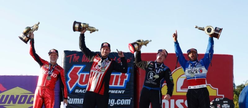 (Left to right) Pro Stock Motorcycle rider Matt Smith, Pro Stock driver Dallas Glenn, Funny Car racer Austin Prock and Top Fuel pilot Antron Brown celebrate victories at the NHRA Carolina Nationals at zMAX Dragway on Sunday, Sept. 22, 2024.